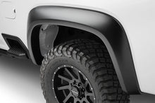 Load image into Gallery viewer, Husky Liners 20-25 Chevrolet Silverado 2500 HD Extend-A-Fender Flares 4pc - Blk - Installation View