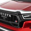 Load image into Gallery viewer, Husky Liners 20-26 Toyota Hilux Aeroskin Hood Protector - Chrome - Side View