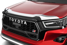 Load image into Gallery viewer, Husky Liners 20-26 Toyota Hilux Aeroskin Hood Protector - Chrome - Side View
