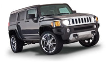 Load image into Gallery viewer, Husky Liners OE Style Black Fender Flares - 4pc fits 2006-2010 Hummer H3 - Main Product View