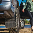 Load image into Gallery viewer, Husky Liners Universal 12in Wide Black Rubber Front Mud Flaps w/ Weight - Side View
