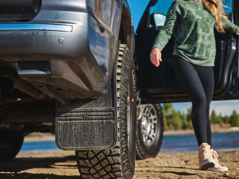 Husky Liners Universal 12in Wide Black Rubber Front Mud Flaps w/ Weight - Side View