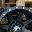 Load image into Gallery viewer, ICON 17in Compression/Alpha/Rebound Wheel Rock Ring Kit (20 Bolt) - Back View