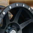 Load image into Gallery viewer, ICON 17in Compression/Alpha/Rebound Wheel Rock Ring Kit (20 Bolt) - Installation View