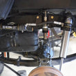 Load image into Gallery viewer, ICON 2005+ Toyota Tacoma Multi Rate RXT Leaf Pack w/Add In Leaf - Side View