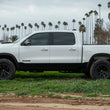 Load image into Gallery viewer, ICON 2019+ Ram 1500 2/4WD .75-2.5in Stage 4 Suspension System w/Tubular Uca - Installation View