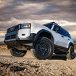 Load image into Gallery viewer, ICON 2024 Toyota Land Cruiser 250 - 2.5 Series Front Coilover Kit V.S. 1.25-3 in Lift - Installation View
