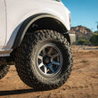 Load image into Gallery viewer, ICON Rebound Pro 17x8.5 6x5.5 25mm Offset 5.75in BS 95.1mm Bore Titanium Wheel - Back View