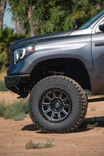 Load image into Gallery viewer, ICON Recoil 20x10 5x150 -24mm Offset 4.5in BS Gloss Black Milled Spokes Wheel - Side View