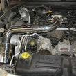 Load image into Gallery viewer, Injen 00-04 Dakota 4.7L V8 (w/o Cruise Control) Power-Flow (incl. Diamond plate heat shield) Polishe - Installation View