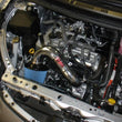 Load image into Gallery viewer, Injen 13-19 Toyota Prius C 1.5L 4cyl HYBRID Black Tuned Intake w/MR Tech/Air Fusion - Installation View