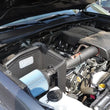 Load image into Gallery viewer, Injen 16-20 Toyota Tacoma 3.5L V6 Short-Ram Intake System W/ Air Fusion (Incl Heat Shield) Polished - Side View