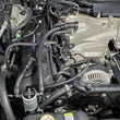 Load image into Gallery viewer, J&amp;L 03-04 Mercury Marauder Passenger Side Oil Separator 3.0 - Clear Anodized - Side View