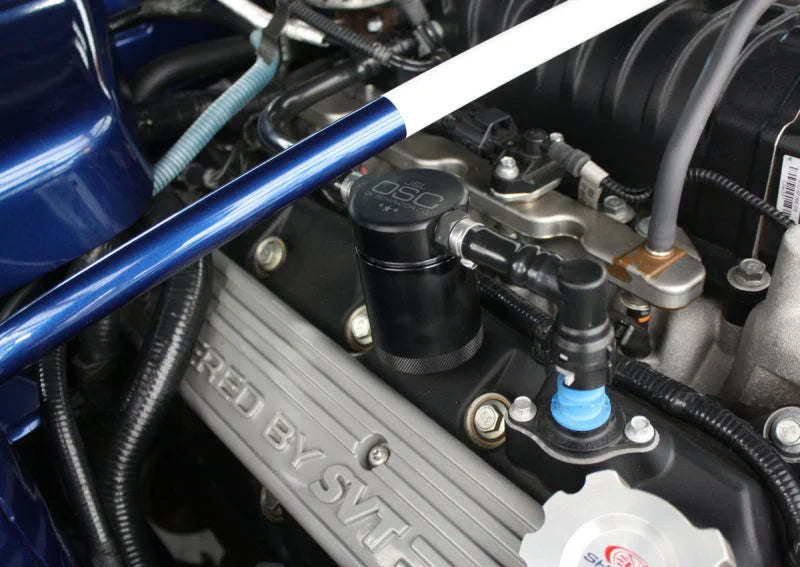 J&L 07-14 Ford Mustang GT500 Passenger Side Oil Separator 3.0 - Black Anodized - Main Product View