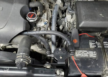 Load image into Gallery viewer, J&amp;L 07-21 Toyota Tundra 5.7L Driver Side Oil Separator 3.0 - Black Anodized - Side View