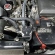 Load image into Gallery viewer, J&amp;L 07-21 Toyota Tundra 5.7L Driver Side Oil Separator 3.0 - Clear Anodized - Side View