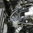Load image into Gallery viewer, J&amp;L 10-15 Chevrolet Camaro LS3 6.2L Passenger Side Oil Separator 3.0 - Clear Anodized - Detail View