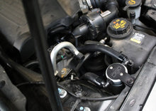 Load image into Gallery viewer, J&amp;L 10-18 Ford Taurus Sho EcoBoost V6 Passenger Side Oil Separator 3.0 - Clear Anodized - Detail View