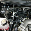 Load image into Gallery viewer, J&amp;L 10-19 Ford Flex EcoBoost V6 Passenger Side Oil Separator 3.0 - Black Anodized - Side View