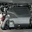 Load image into Gallery viewer, J&amp;L 10-19 Ford Flex EcoBoost V6 Passenger Side Oil Separator 3.0 - Black Anodized - Detail View