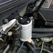 Load image into Gallery viewer, J&amp;L 11-14 Ford F-150/Ford F-150 Raptor 6.2L Passenger Side Oil Separator 3.0 - Clear Anodized - Side View