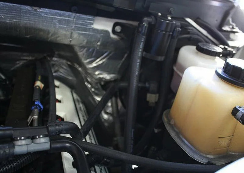 J&L 11-17 Ford F-150 5.0L / 11-14 Ford F-150 6.2L Driver Side Oil Separator 3.0- Black Anodized - Side View
