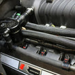 Load image into Gallery viewer, J&amp;L 11-17 Ford Mustang GT (w/Roush/VMP S/C) Passenger Side Oil Separator 3.0 - Black Anodized