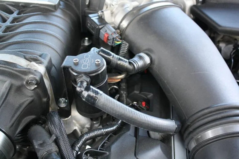 J&L 11-17 Ford Mustang GT (w/Roush/VMP Supercharger) Driver Side Oil Separator 3.0 - Black Anodized - Main Product View
