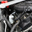 Load image into Gallery viewer, J&amp;L 11-17 Ford Mustang V6 Passenger Side Oil Separator 3.0 - Clear Anodized - Main Product View
