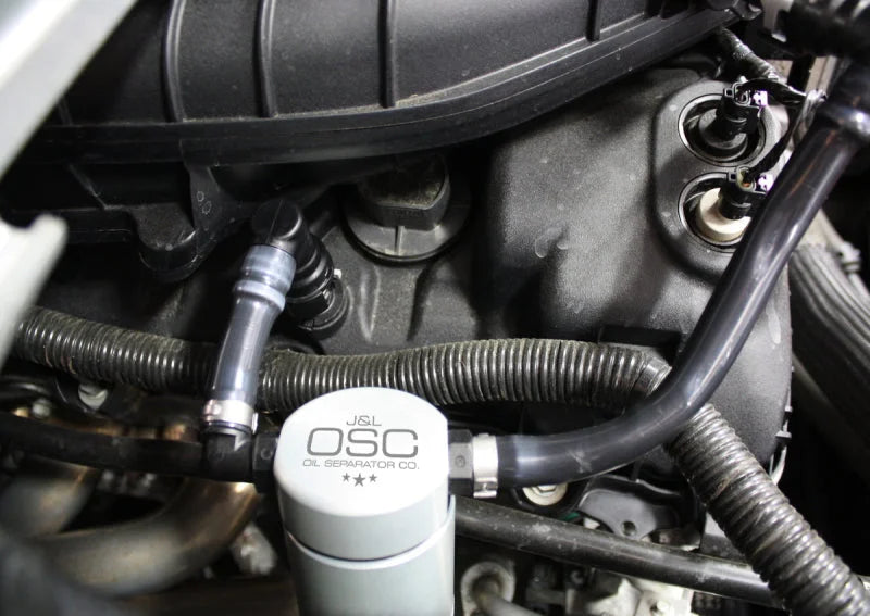 J&L 11-17 Ford Mustang V6 Passenger Side Oil Separator 3.0 - Clear Anodized - Side View