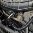 Load image into Gallery viewer, J&amp;L 11-17 Ford Mustang V6 Passenger Side Oil Separator 3.0 V2 - Black Anodized - Side View