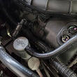 Load image into Gallery viewer, J&amp;L 11-17 Ford Mustang V6 Passenger Side Oil Separator 3.0 V2 - Clear Anodized - Side View