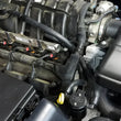 Load image into Gallery viewer, J&amp;L 11-25 Jeep Grand Cherokee 5.7L Passenger Side Oil Separator 3.0 - Black Anodized - Detail View