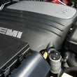 Load image into Gallery viewer, J&amp;L 11-25 Jeep Grand Cherokee 5.7L Passenger Side Oil Separator 3.0 - Clear Anodized - Side View