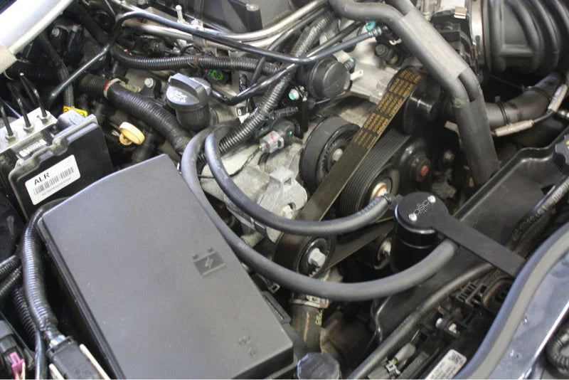J&L 12-15 Chevrolet Camaro ZL1 6.2L Passenger Side Oil Separator 3.0 - Black Anodized - Side View