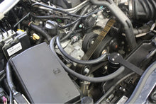 Load image into Gallery viewer, J&amp;L 12-15 Chevrolet Camaro ZL1 6.2L Passenger Side Oil Separator 3.0 - Black Anodized - Side View