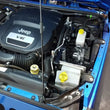 Load image into Gallery viewer, J&amp;L 12-17 Jeep Wrangler JK 3.6L Passenger Side Oil Separator 3.0 - Clear Anodized - Detail View
