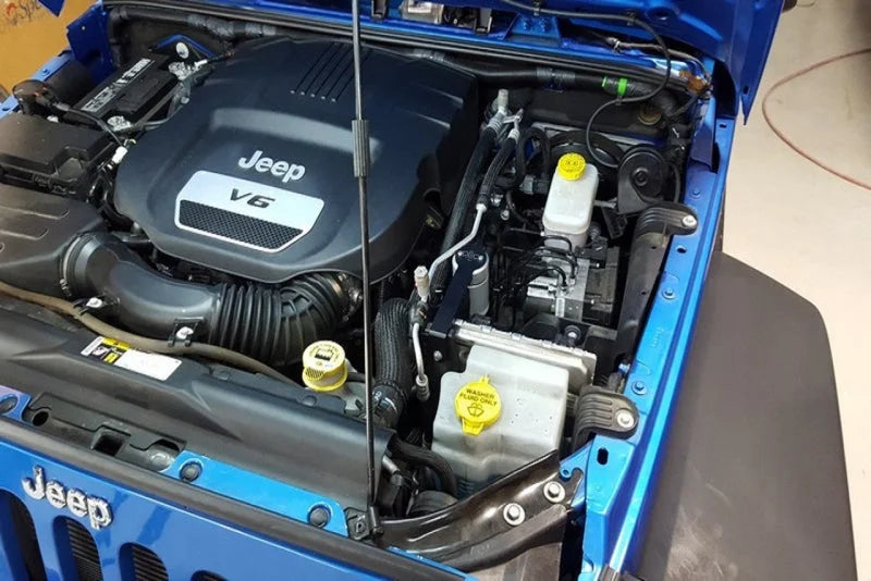J&L 12-17 Jeep Wrangler JK 3.6L Passenger Side Oil Separator 3.0 - Clear Anodized - Detail View