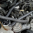 Load image into Gallery viewer, J&amp;L 13-19 Ford Fusion 1.5L EcoBoost Oil Separator 3.0 Passenger Side - Clear Anodized - Detail View