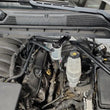 Load image into Gallery viewer, J&amp;L 14-18 Chevy Silverado 1500 / 14-18 GMC Sierra 1500 4.3L V6 Oil Separator - Clear Anodized - Detail View
