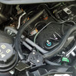 Load image into Gallery viewer, J&amp;L 15-25 Ford Transit 150/250/350 3.5L EcoBoost Passenger Side Oil Separator 3.0 - Black Anodized - Main Product View
