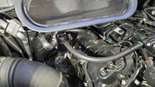 Load image into Gallery viewer, J&amp;L 15-25 Ford Transit 150/250/350 3.5L EcoBoost Passenger Side Oil Separator 3.0 - Black Anodized - Detail View