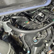 Load image into Gallery viewer, J&amp;L 15-25 Ford Transit 150/250/350 3.5L EcoBoost Passenger Side Oil Separator 3.0 - Clear Anodized - Detail View