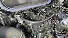 Load image into Gallery viewer, J&amp;L 15-25 Ford Transit 150/250/350 3.5L EcoBoost Passenger Side Oil Separator 3.0 - Clear Anodized - Detail View