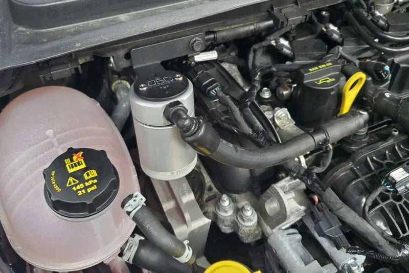 J&L 16-19 Ford Escape 1.5L EcoBoost Passenger Side Oil Separator 3.0 - Clear Anodized - Side View