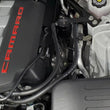 Load image into Gallery viewer, J&amp;L 16-24 Chevrolet Camaro LT1 6.2L Driver Side Oil Separator 3.0 - Black Anodized - Side View
