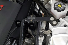 Load image into Gallery viewer, J&amp;L 16-24 Chevrolet Camaro LT1 6.2L Driver Side Oil Separator 3.0 - Black Anodized - Detail View