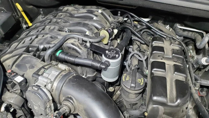 J&L 16-24 Dodge Durango / Jeep Grand Cherokee 3.6L Oil Separator 3.0 Passenger Side - Clear Anod - Detail View