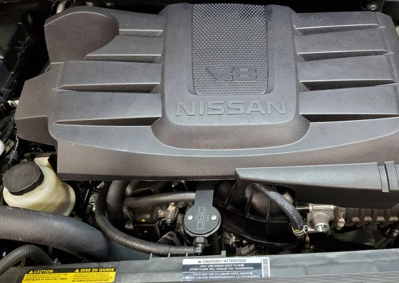 J&L 16-24 Nissan Titan 5.6L Passenger Side Oil Separator 3.0 - Black Anodized - Side View