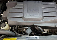 Load image into Gallery viewer, J&amp;L 16-24 Nissan Titan 5.6L Passenger Side Oil Separator 3.0 - Black Anodized - Side View